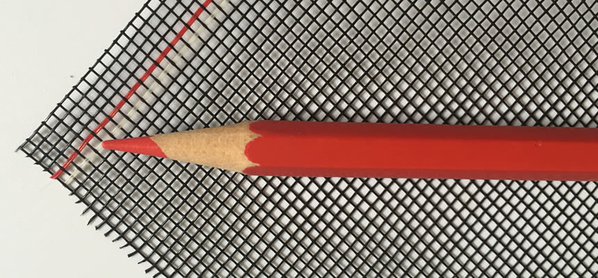 A red pencil on black pet screen for contrast.