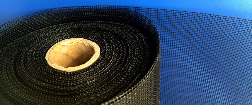 The detail about black pet screen roll on the dark blue background.